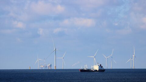 Oil tanker sailing at sea under a cloudy sky